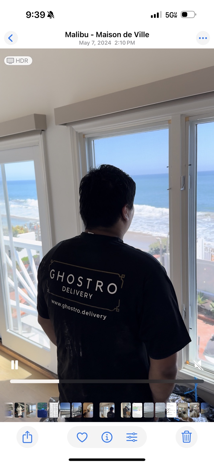 Ghostro team member at work in an oceanfront home